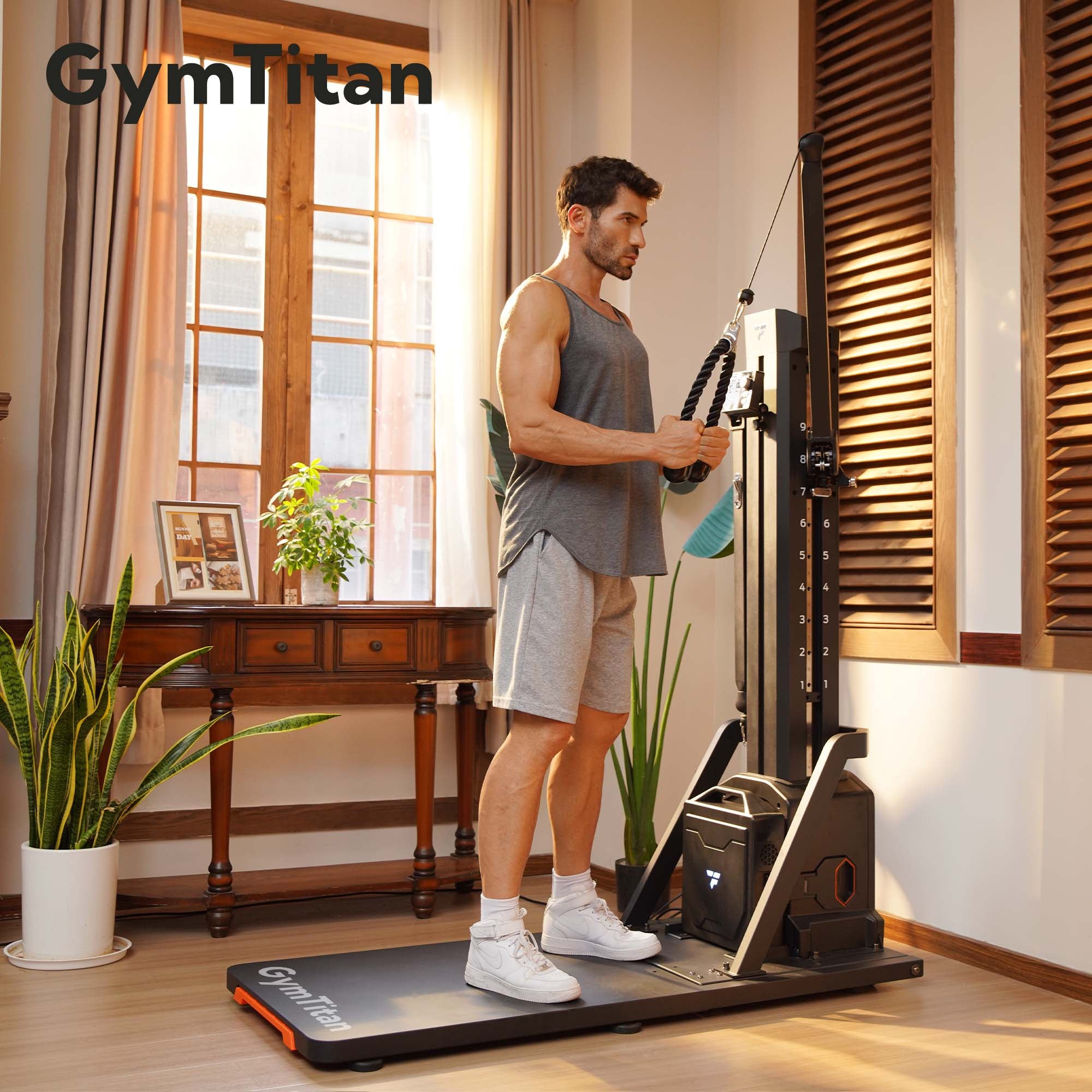 Man using Titan home gym machine with rope attachment for strength training.